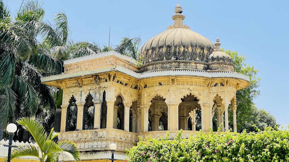 a building with a dome and columns