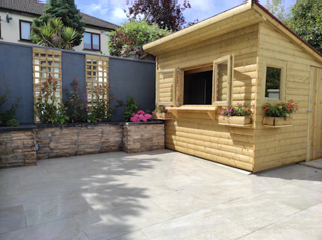 a house with a stone wall