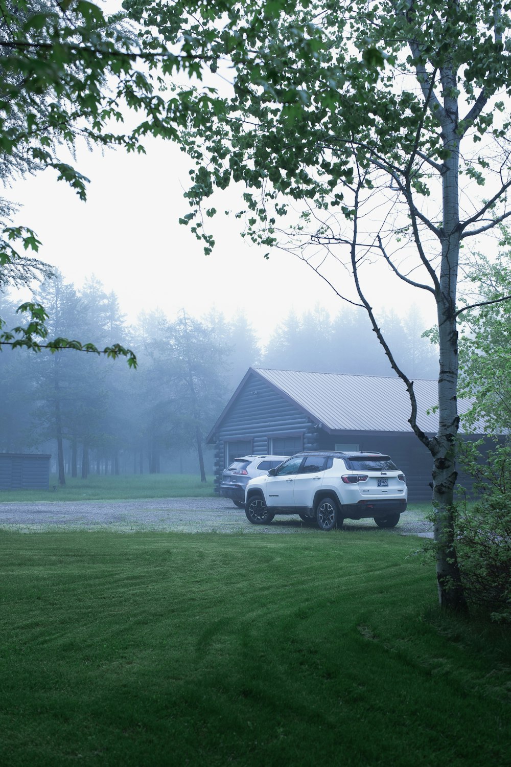 a white car parked in a driveway