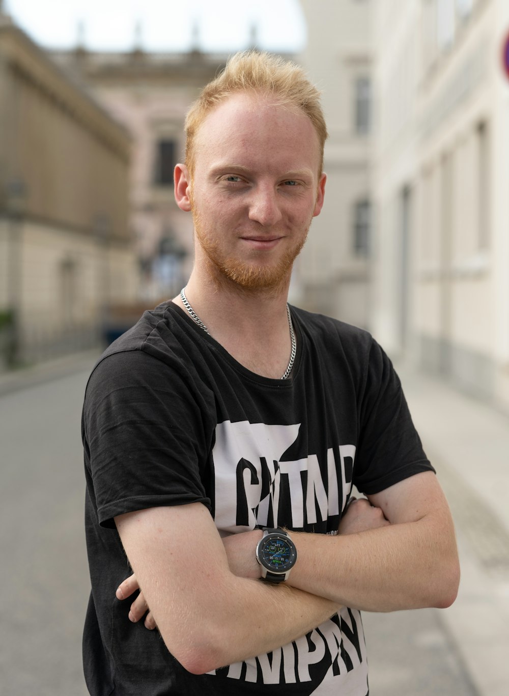 a man with a beard and a black shirt