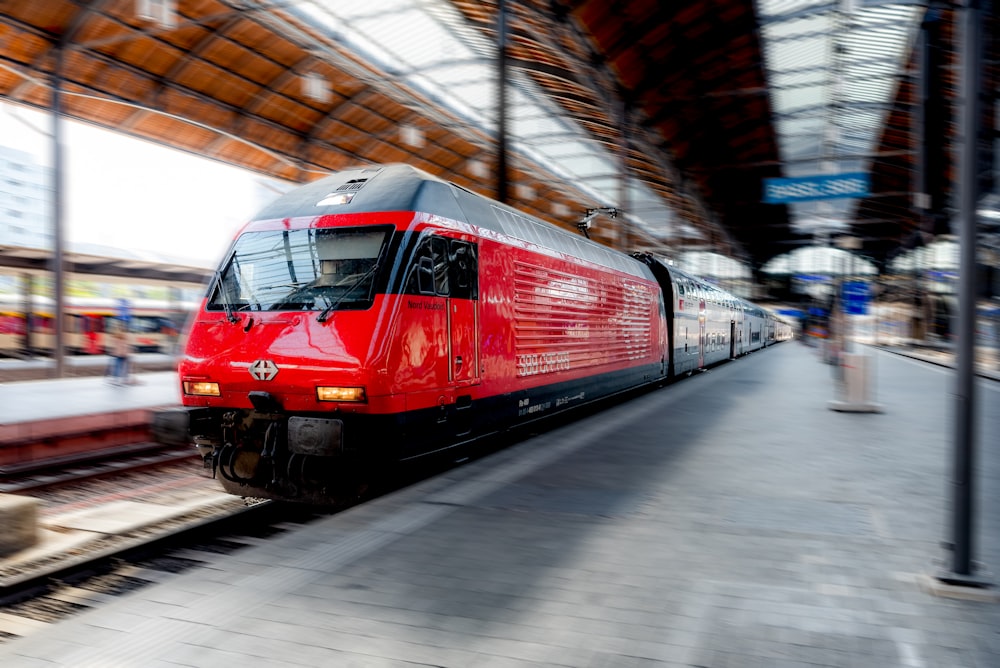 a red train at a train station