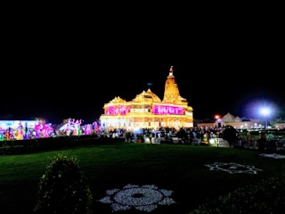 Colorful decorations and devotees gathered during a vibrant temple festival