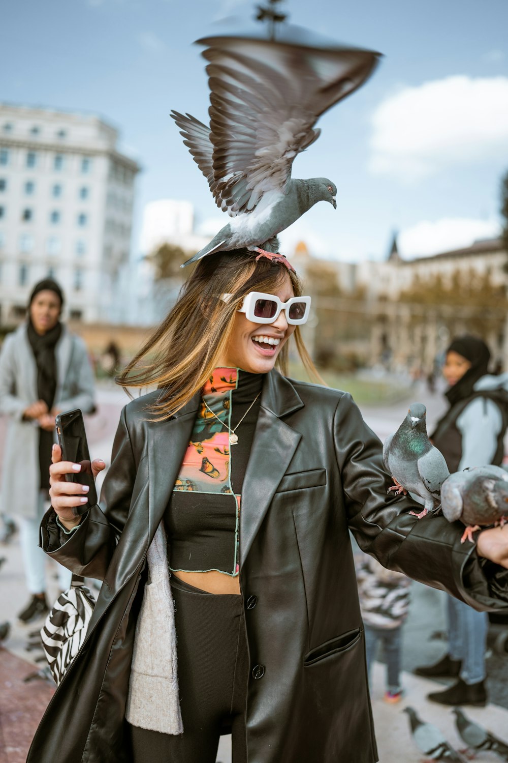 a person with a bird on the head