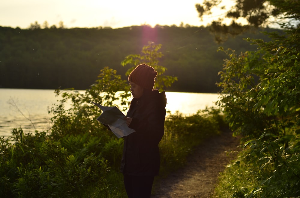 a man holding a book