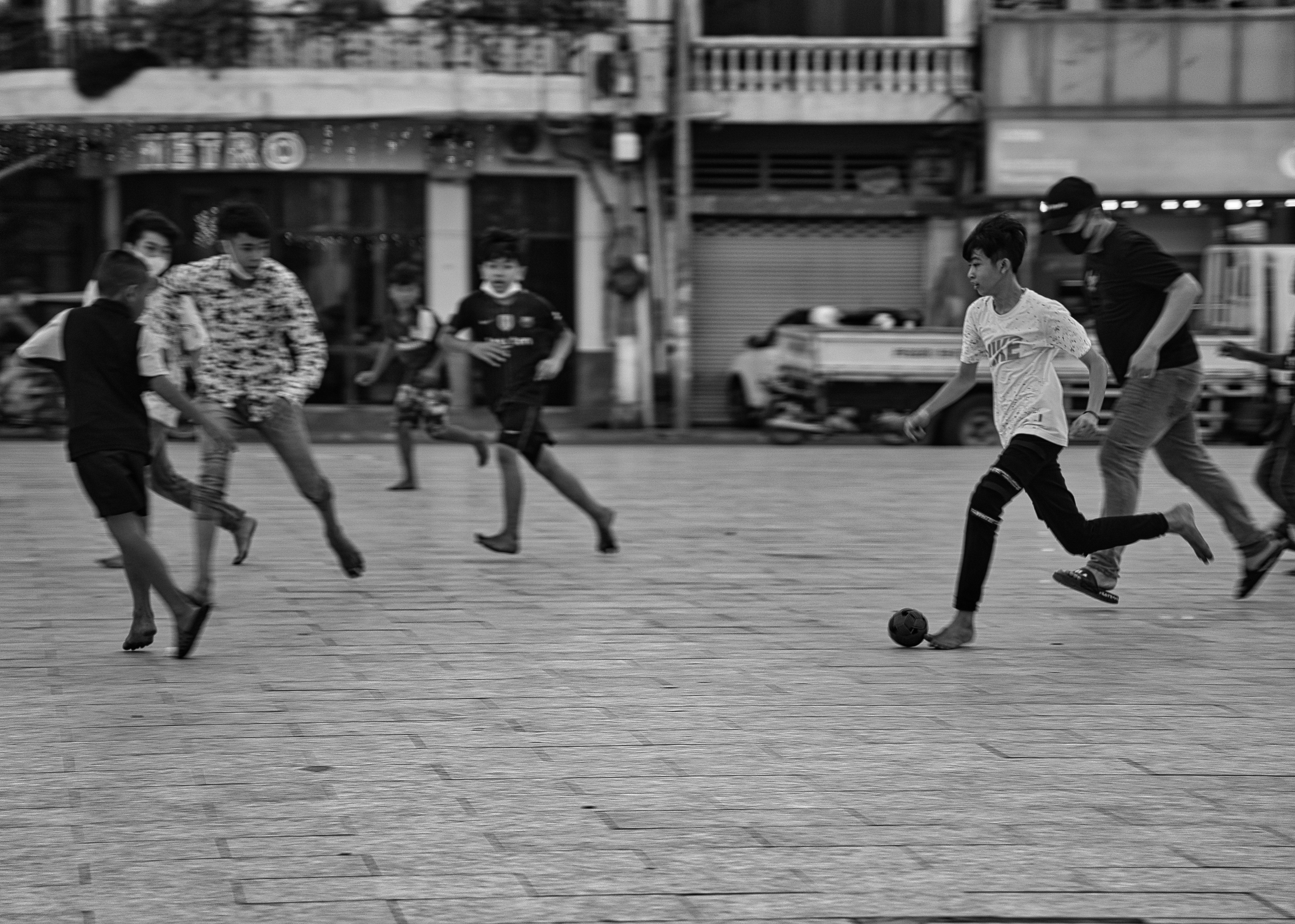 Action during a football challenge on the riverside