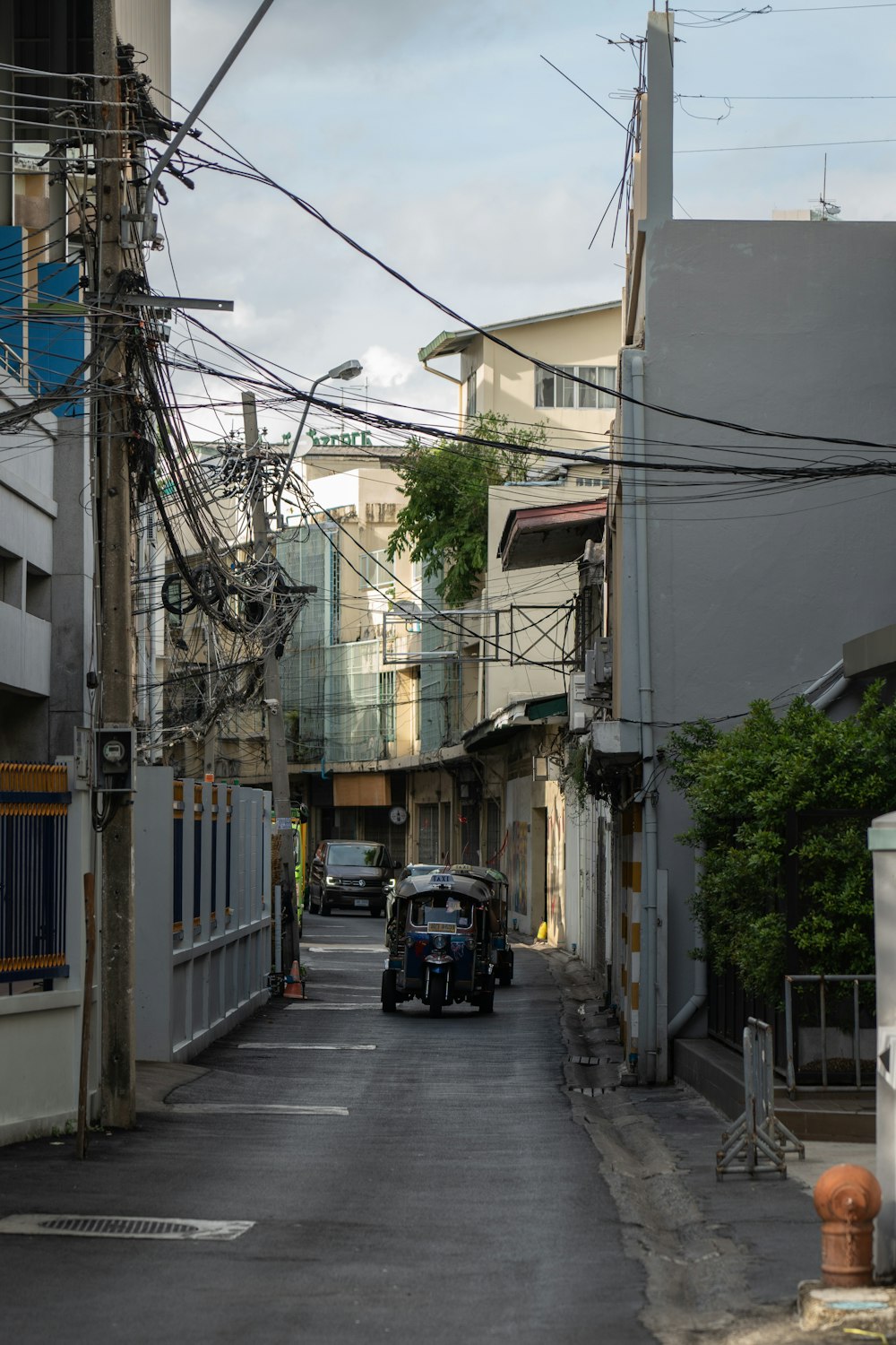 a street with buildings and cars