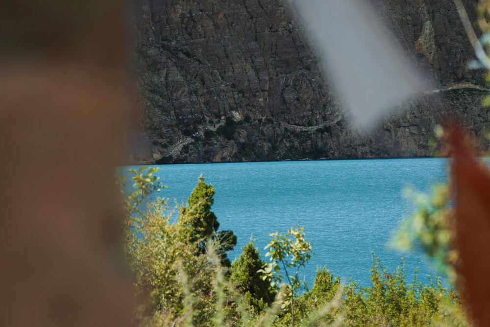 a view of a lake from a cliff
