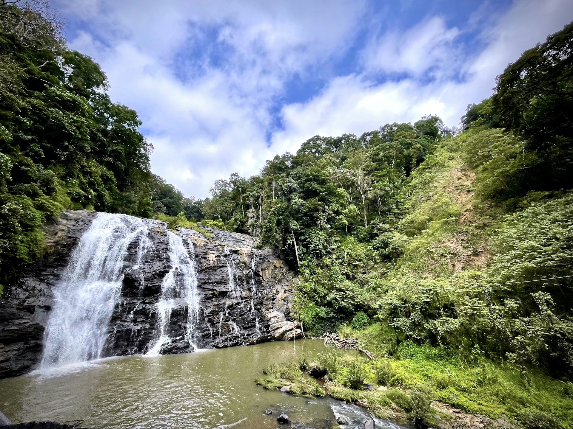 a waterfall in a forest