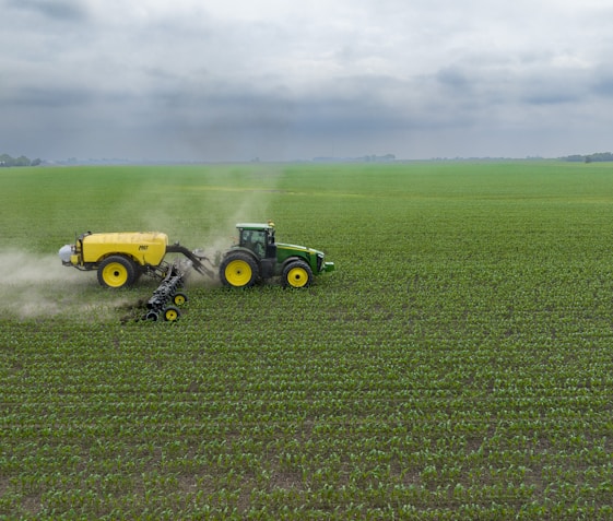 a few farm machines in a field