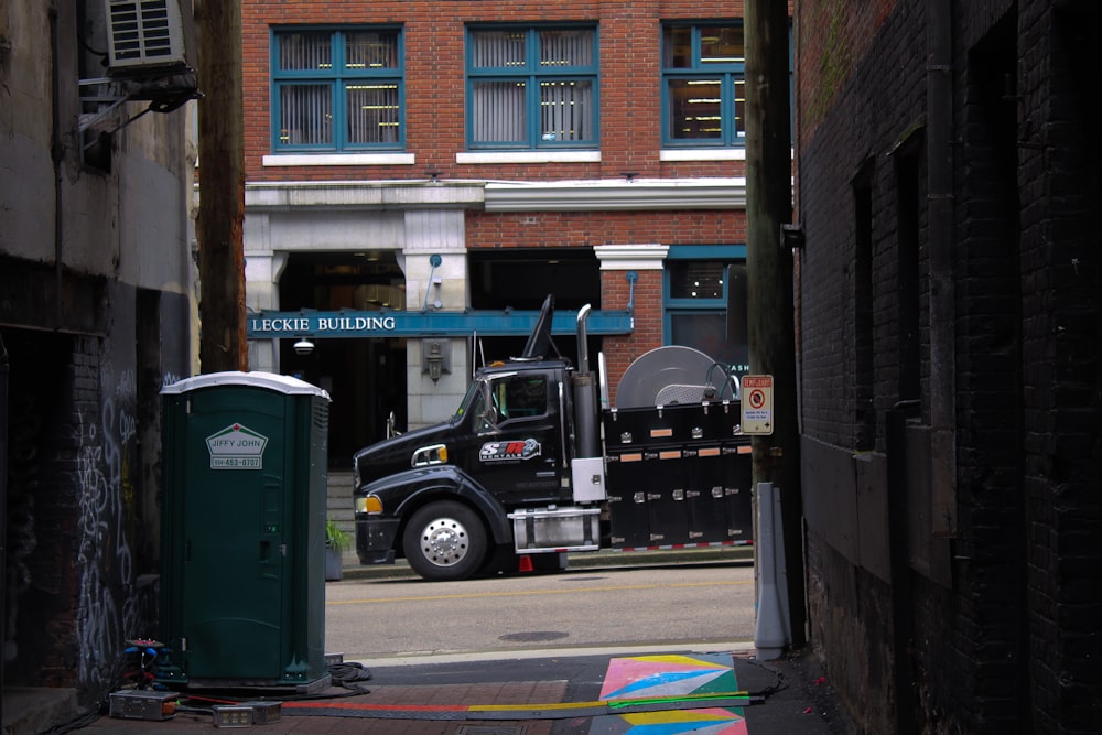a truck parked in a alley