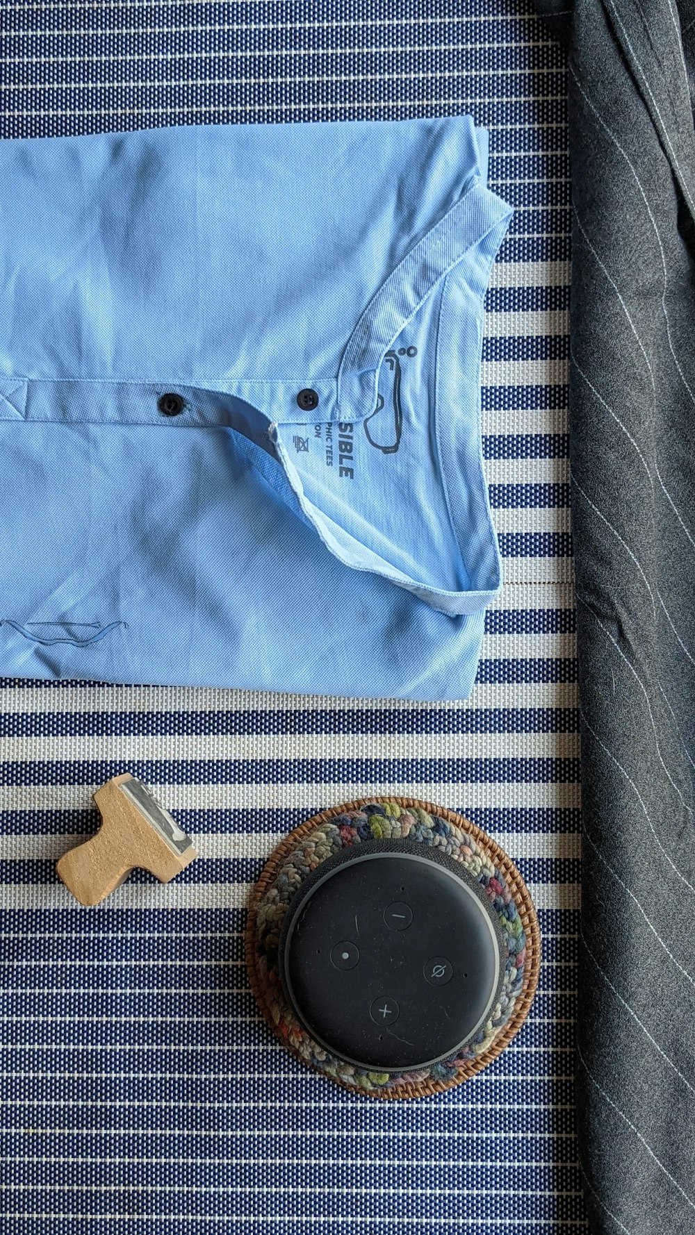 a blue shirt and a pocket watch