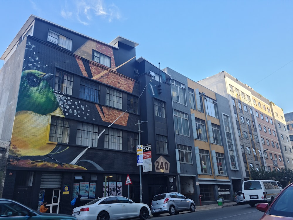 a building with cars parked in front