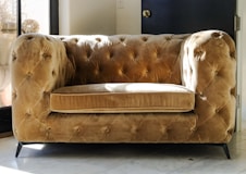 a couch with a cushion