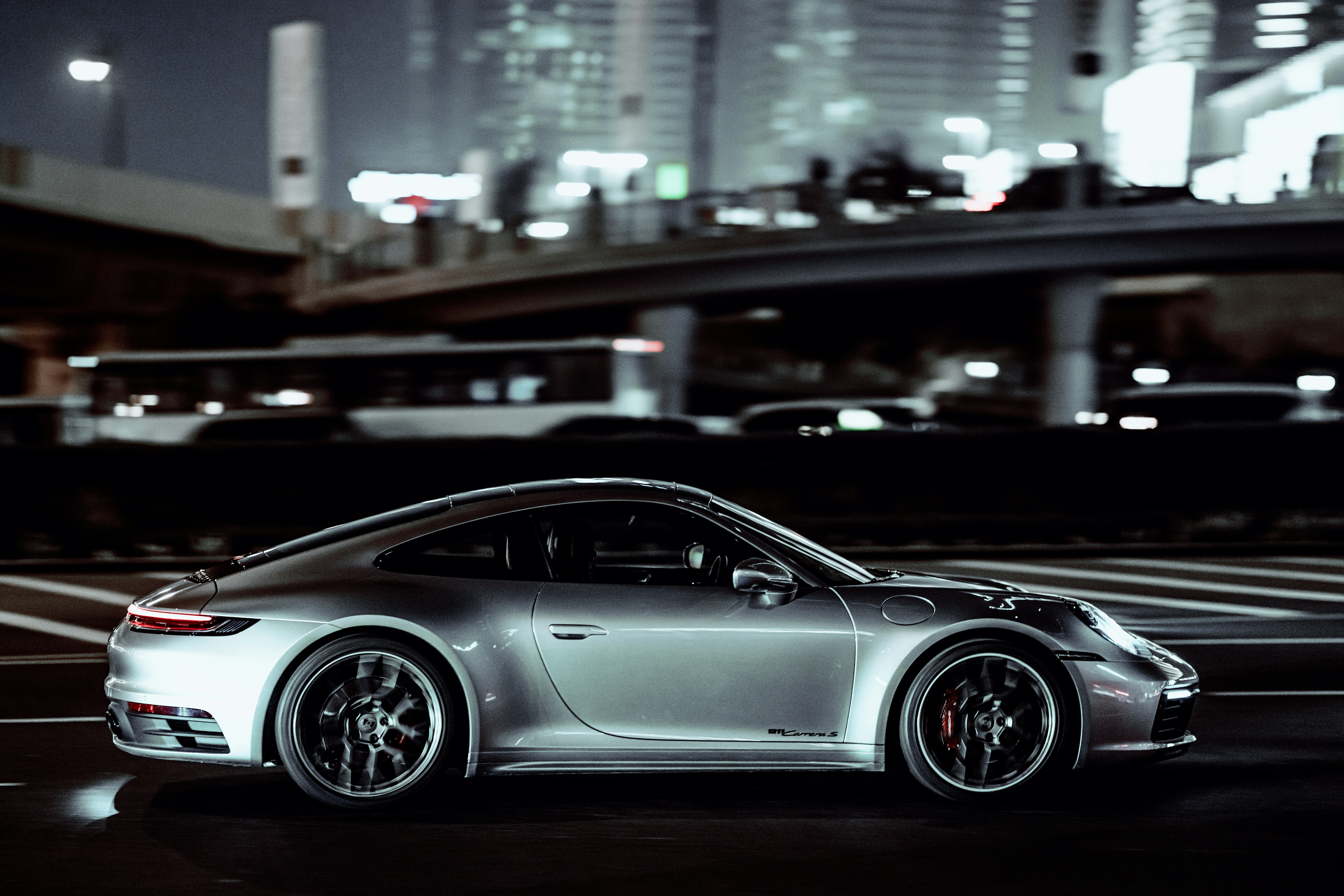 Driving luxury car on the road.