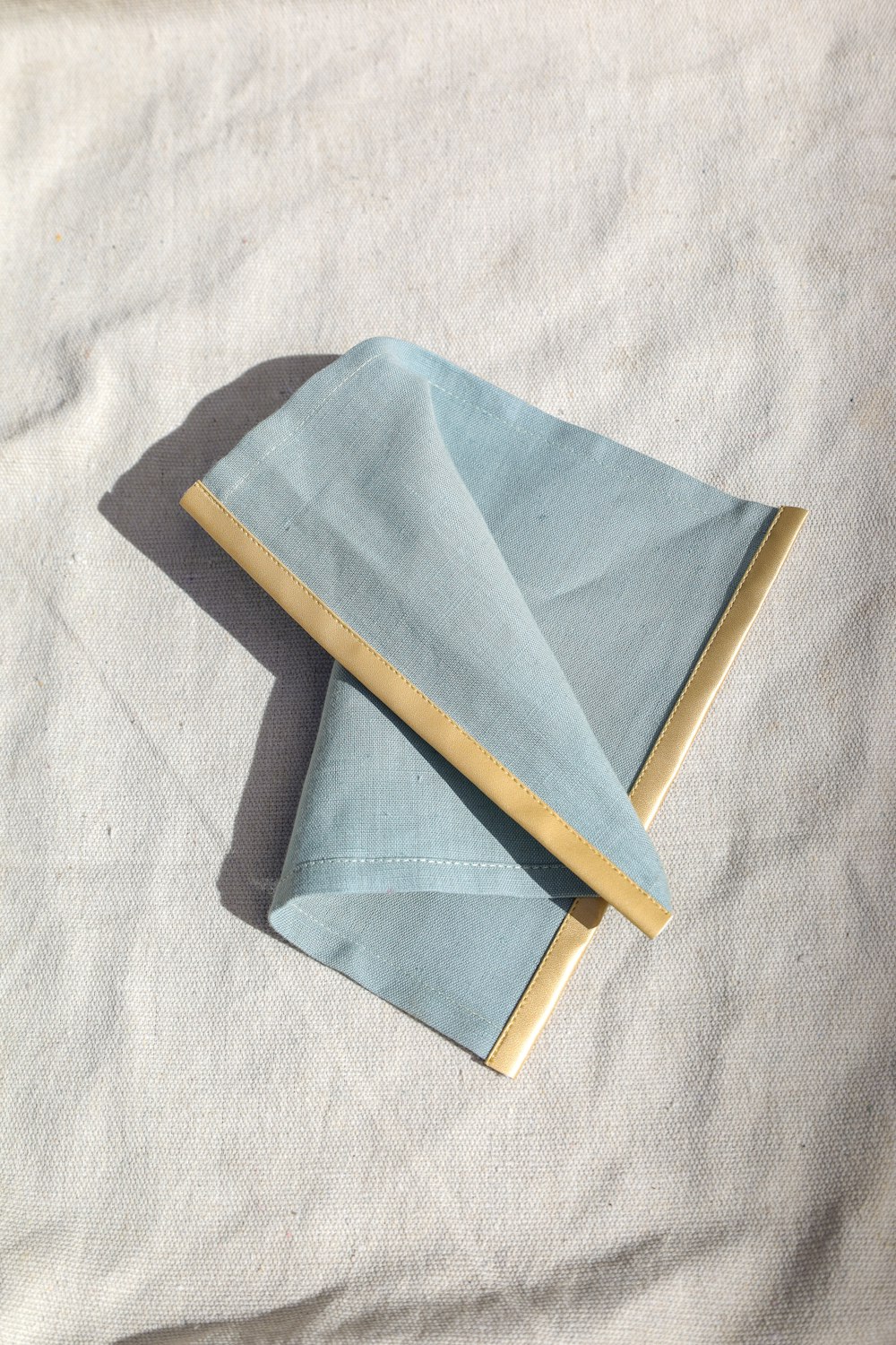 a blue paper origami bird