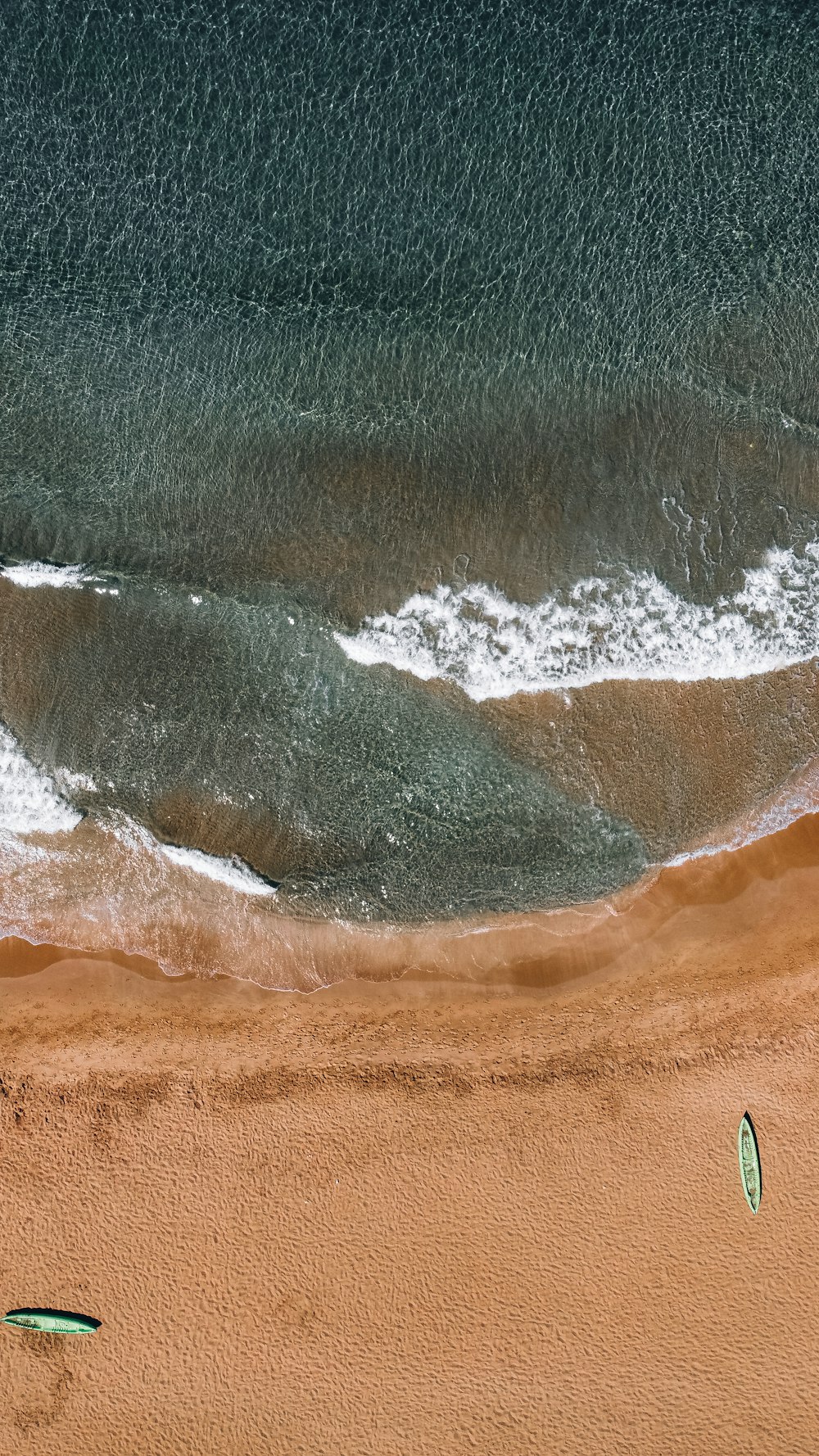 a wave crashing on a beach