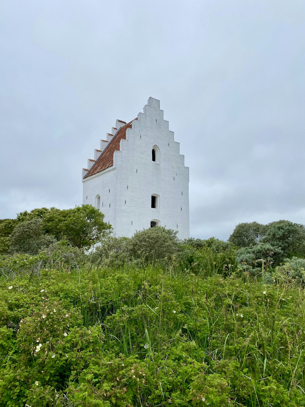 a white building with a tower