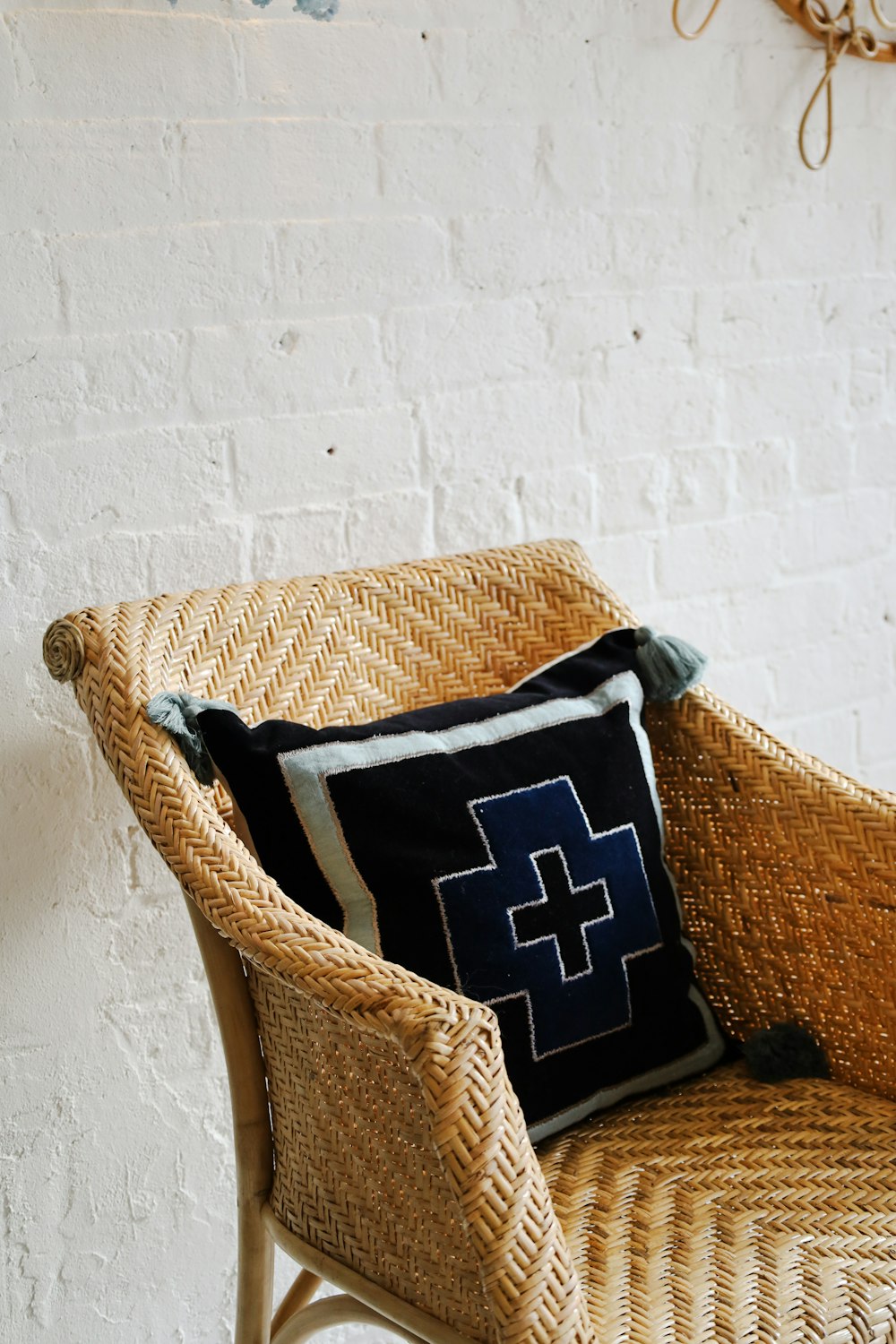 a basket with a blue and white striped cloth in it