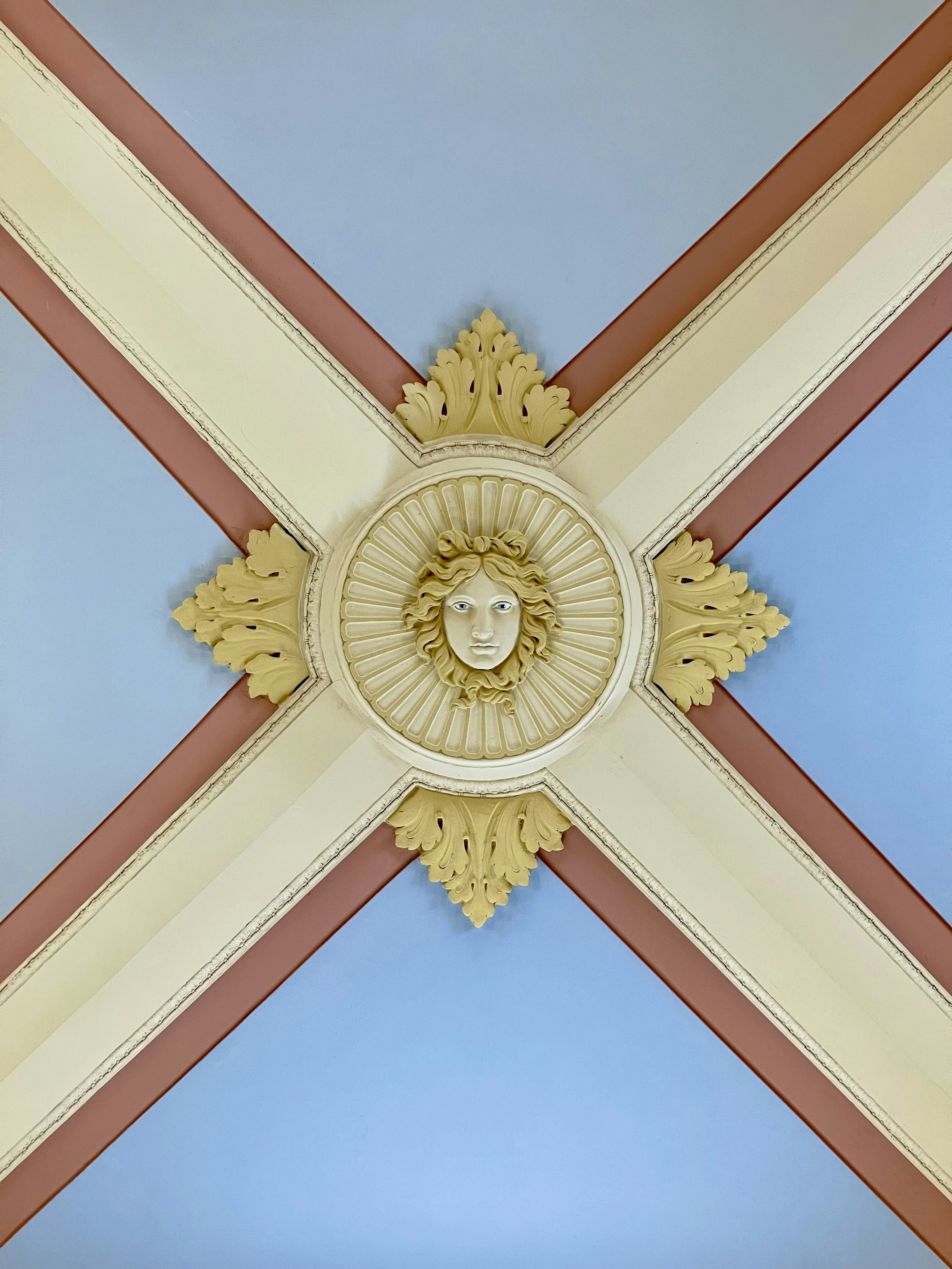 A building with a large gold and red design photo – Free Lansing Image ...