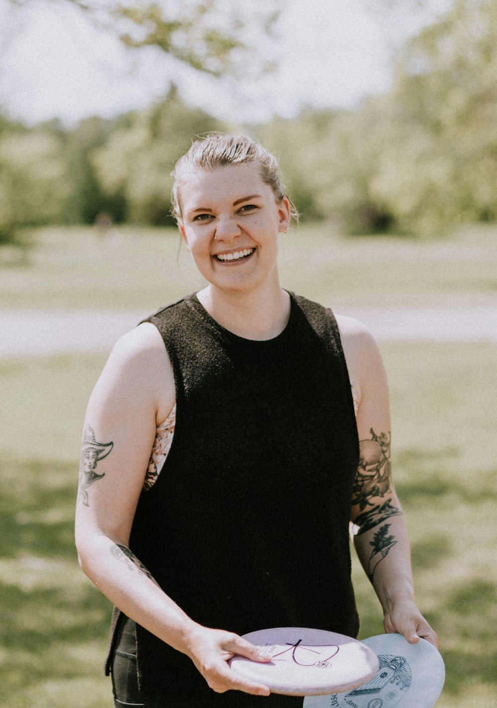 a person holding a frisbee