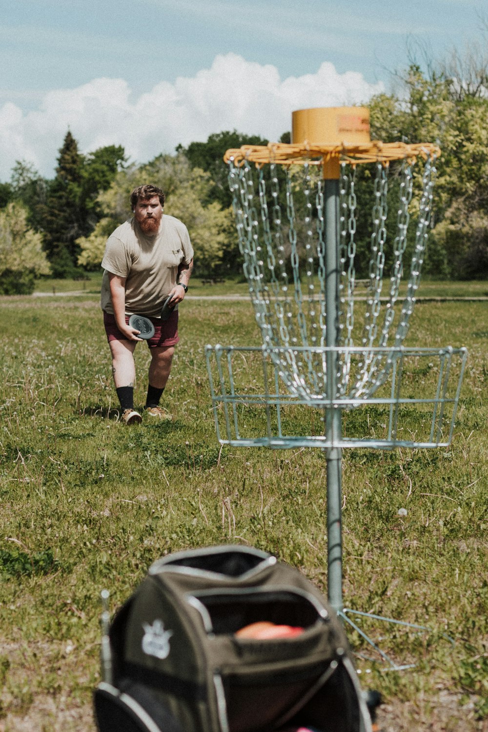 a man throwing a frisbee