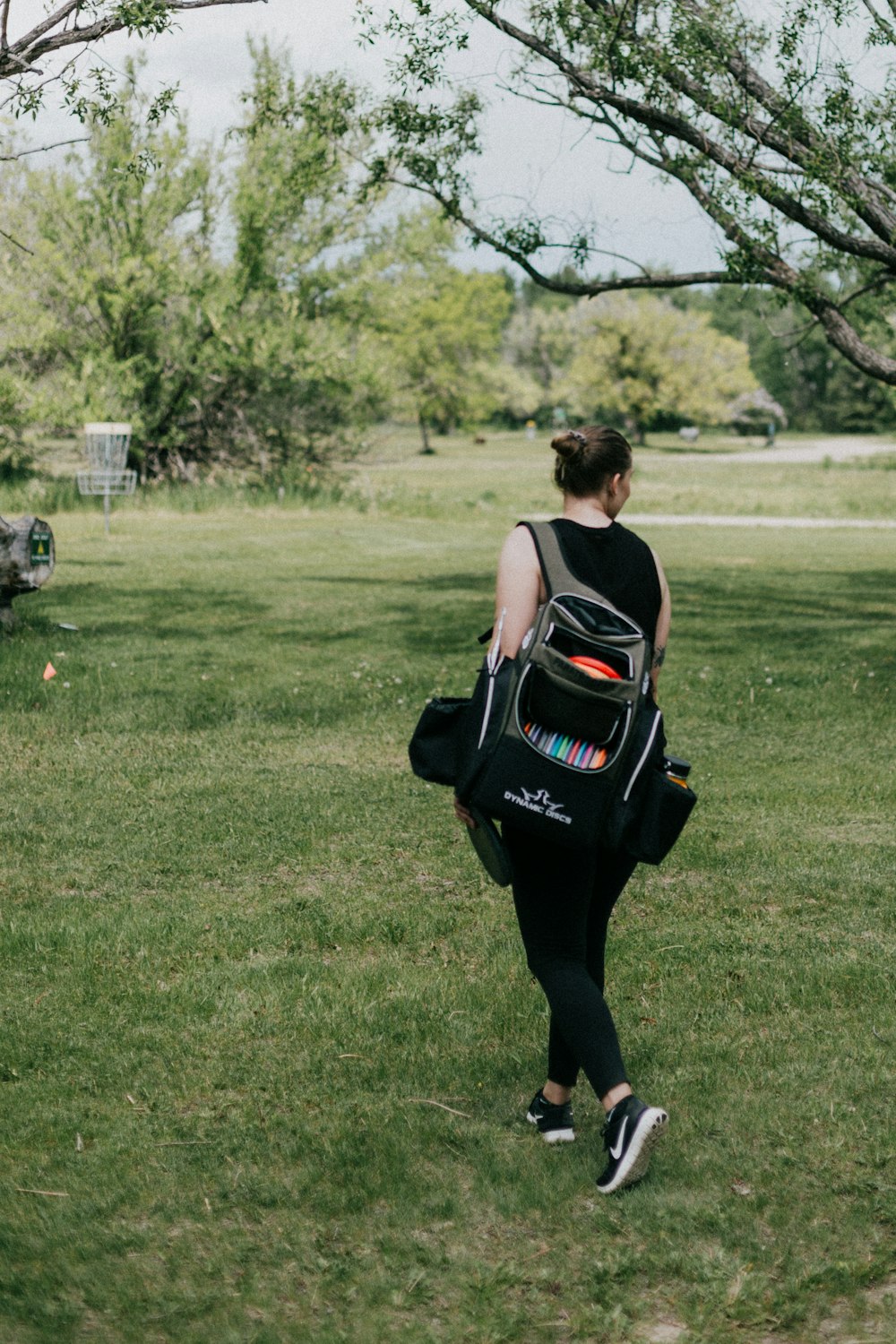 a person walking on a grass field