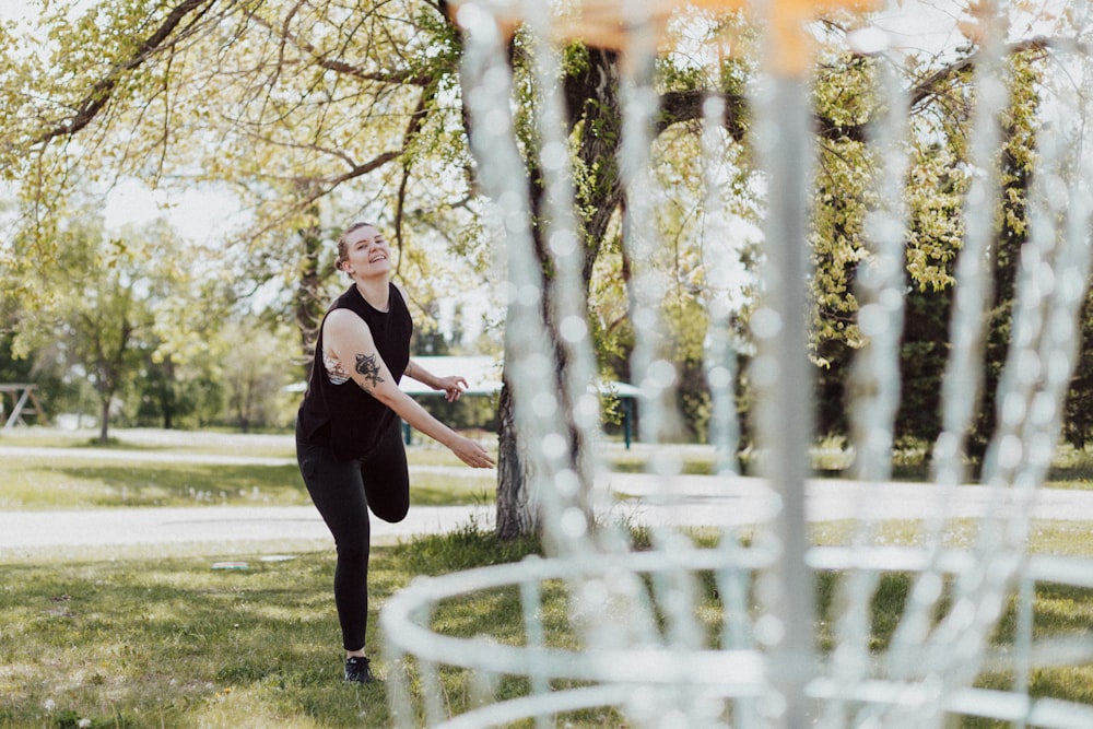 a woman posing in a park