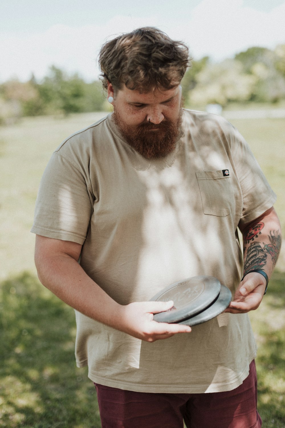 a man holding a frisbee