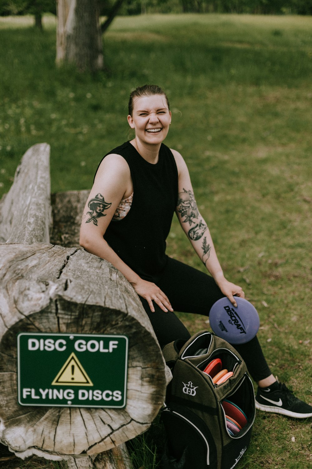 a person sitting on a log