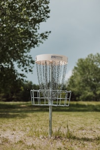 a disc golf hole in a field