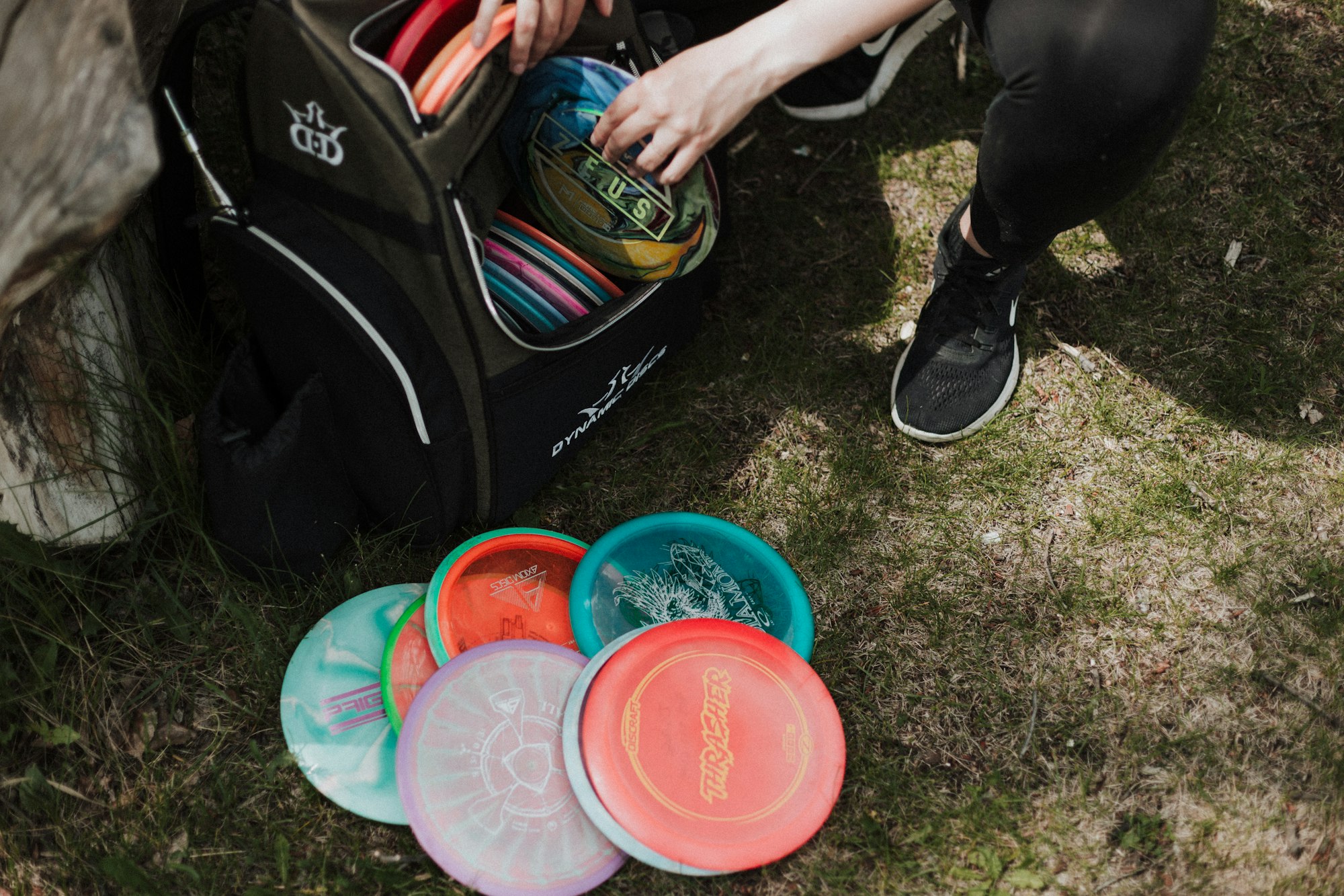 A disc golf starter set with discs, bag and mini marker