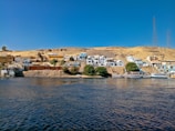 a body of water with buildings along it