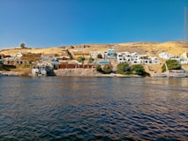 a body of water with buildings along it