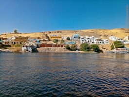 a body of water with buildings along it