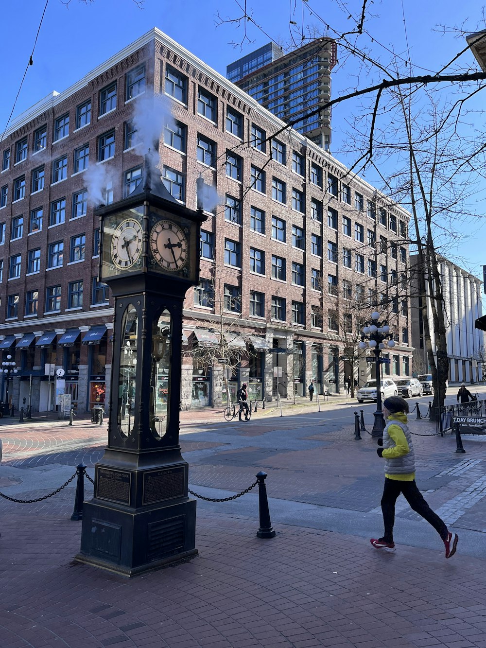 a clock on a sidewalk