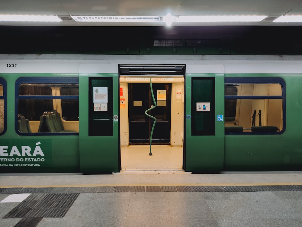 a train with green doors