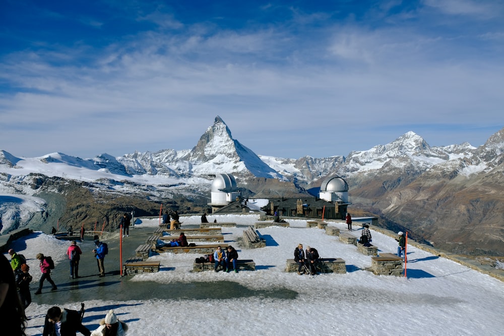 a group of people on a snowy mountain