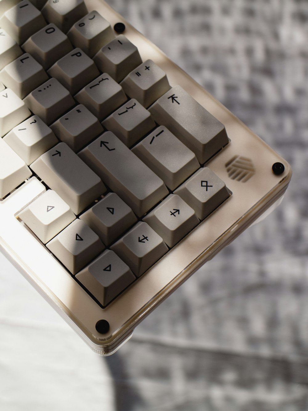 a white keyboard with black keys