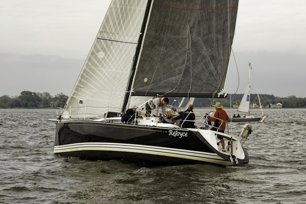 a group of people sailing on a boat