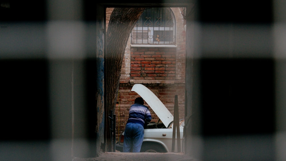 a person carrying an umbrella