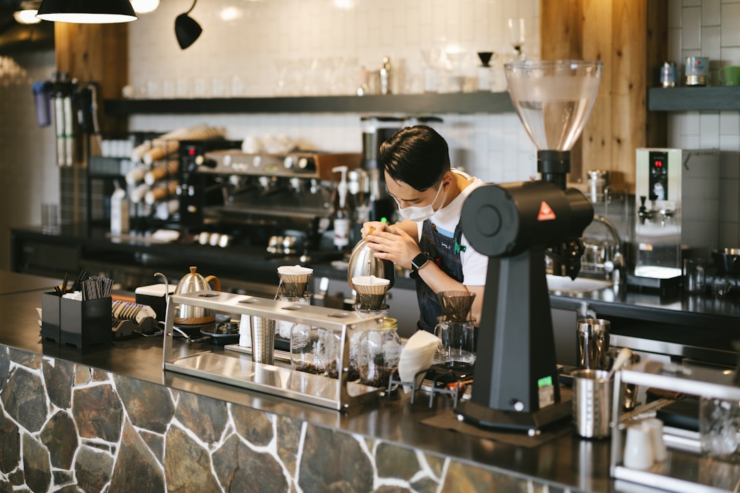 a person working in a kitchen,