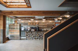 a room with a bar and shelves