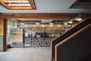 a room with a bar and shelves