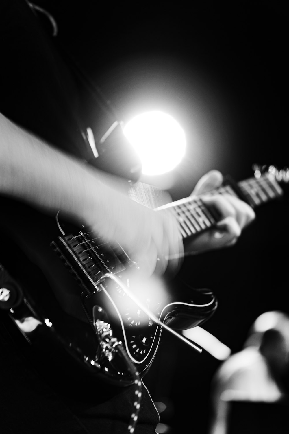 a person playing a guitar