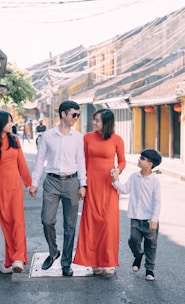 a group of people walking down a street