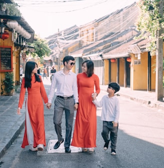 a group of people walking down a street