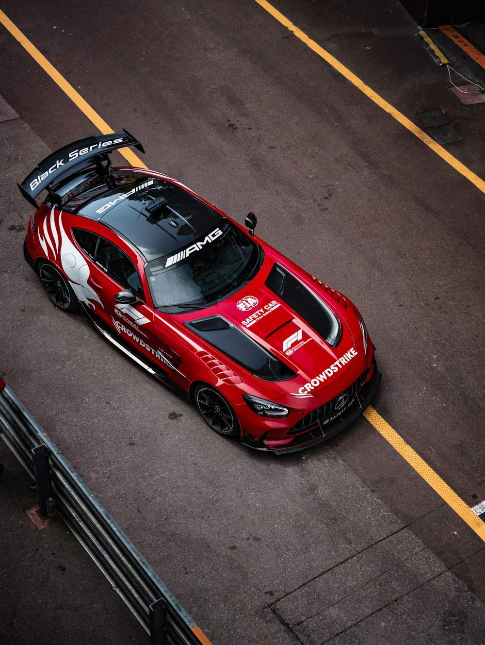 a red race car on a track