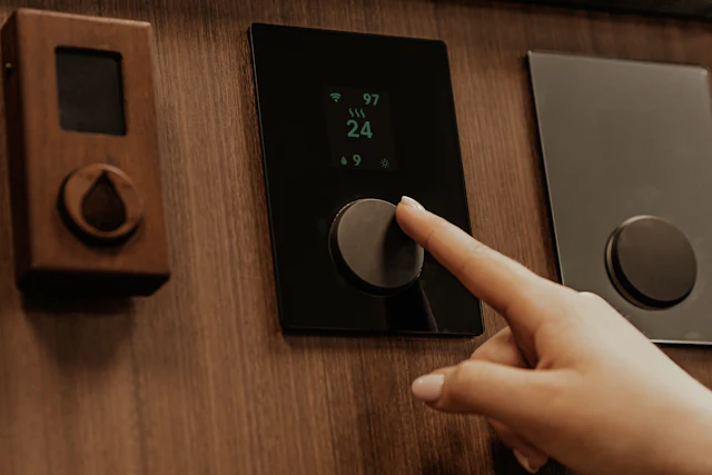 Smart Wi-Fi thermostat installed on a wall