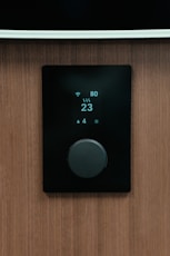 a black rectangular device with a screen