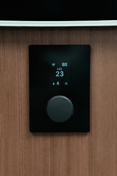 a black rectangular device with a screen